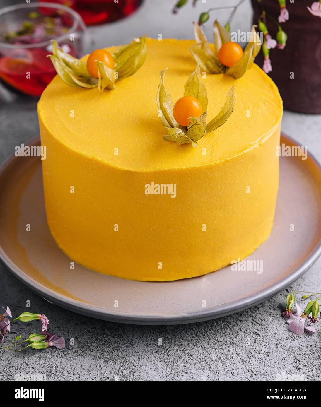 Tasty mango mousse cake on plate Stock Photo