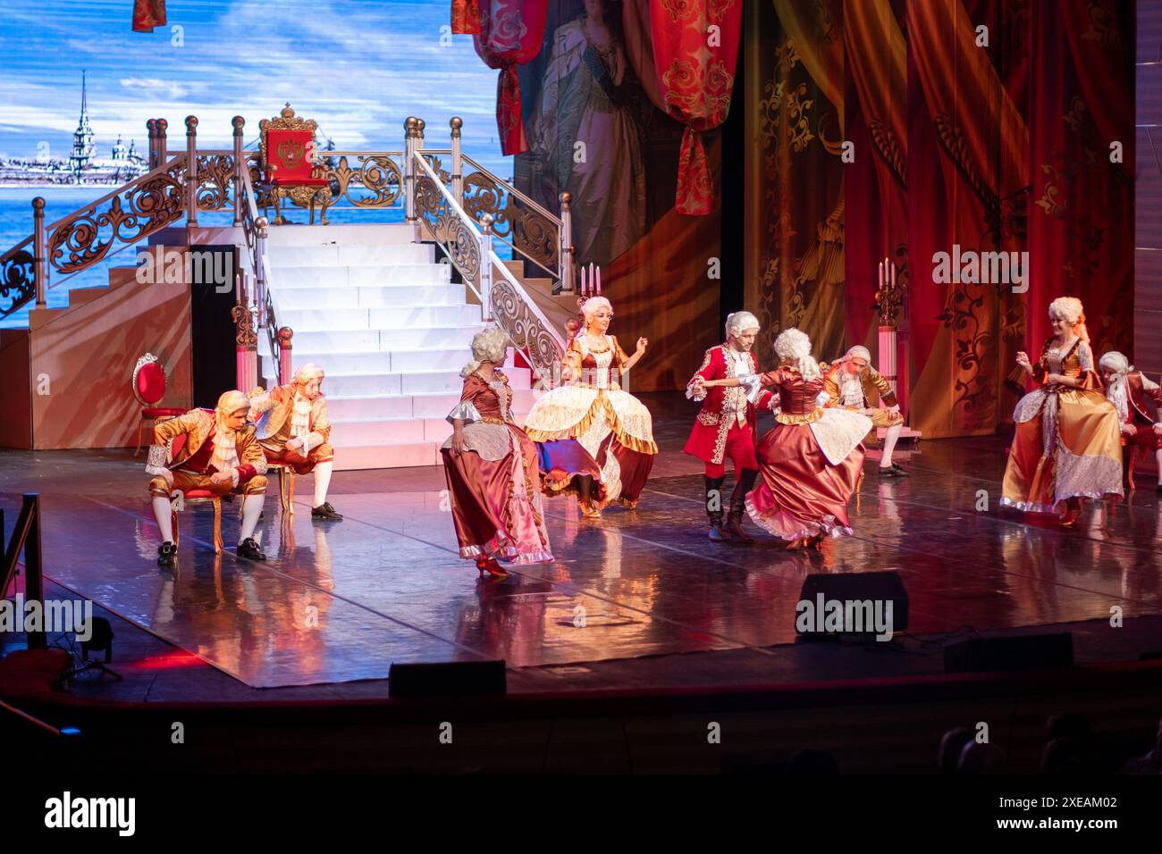 Actresses and actors acting and singing in the musical Stock Photo - Alamy