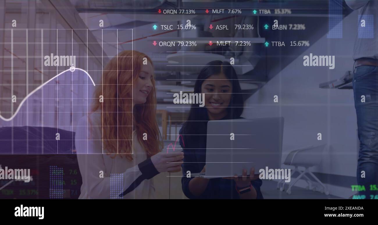 Image of statistical, stock market data processing over two diverse women discussing at office Stock Photo