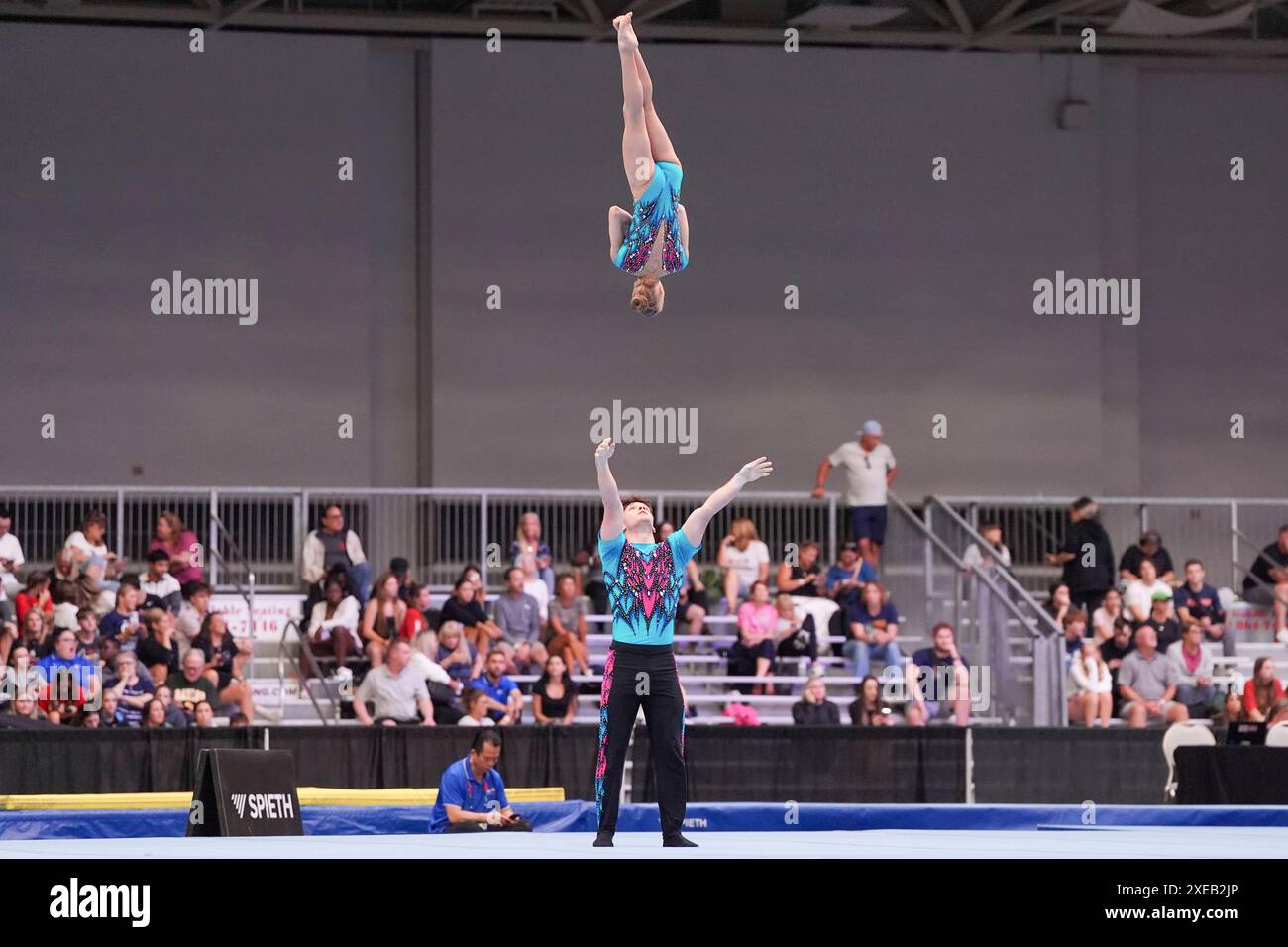 MINNEAPOLIS, MN - JUNE 25: The Moore-Seredich Acro team performs their ...