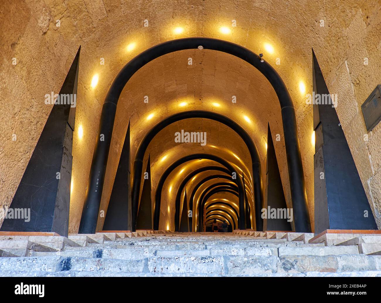an-illuminated-tunnel-entrance-to-the-st-james-cavalier-centre-for-creatvity-valletta-2XEB4AP.jpg