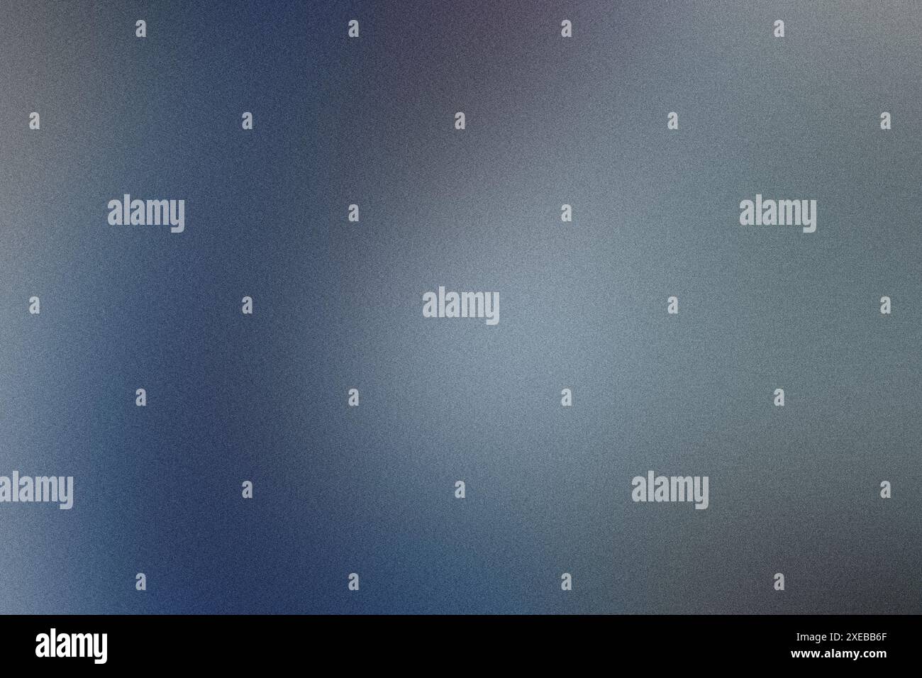 Blurred grainy gradient background transitioning from blue to gray Stock Photo