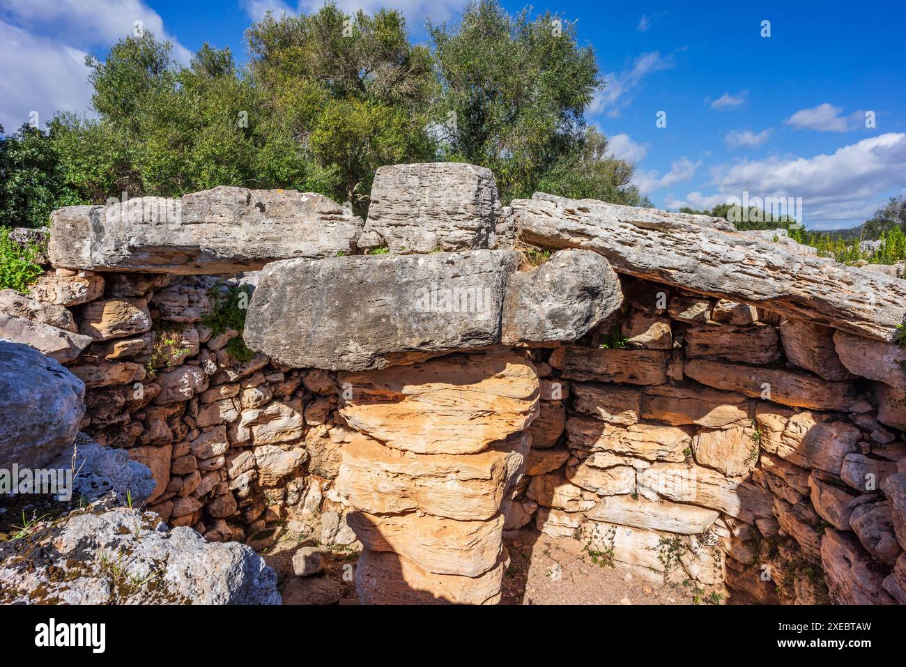 Talaiot from the talaiotic era (Iron Age). Hospitalet Vell archeological site Stock Photo