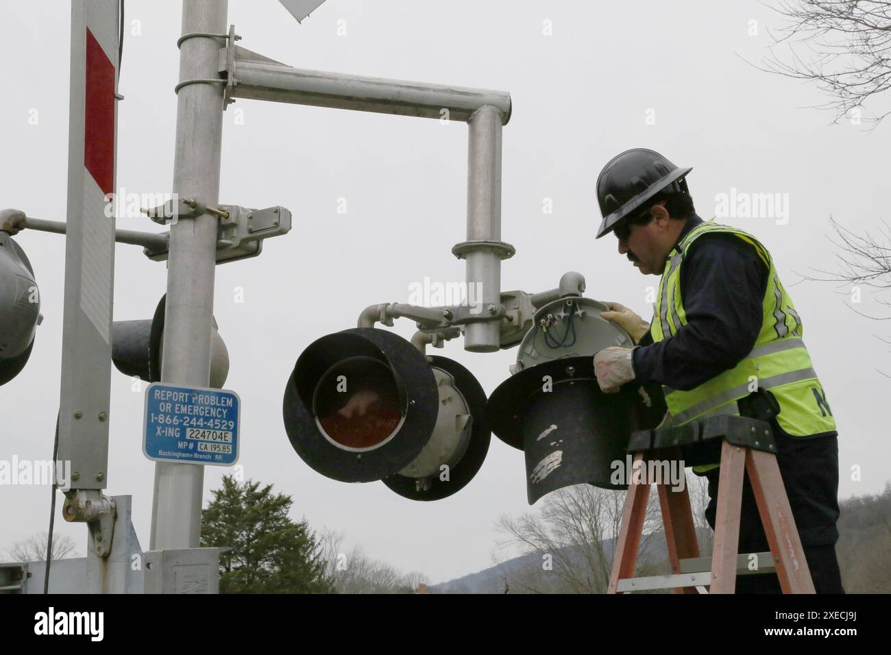 In this photo, NTSB rail investigator Ruben Payan examines one of the