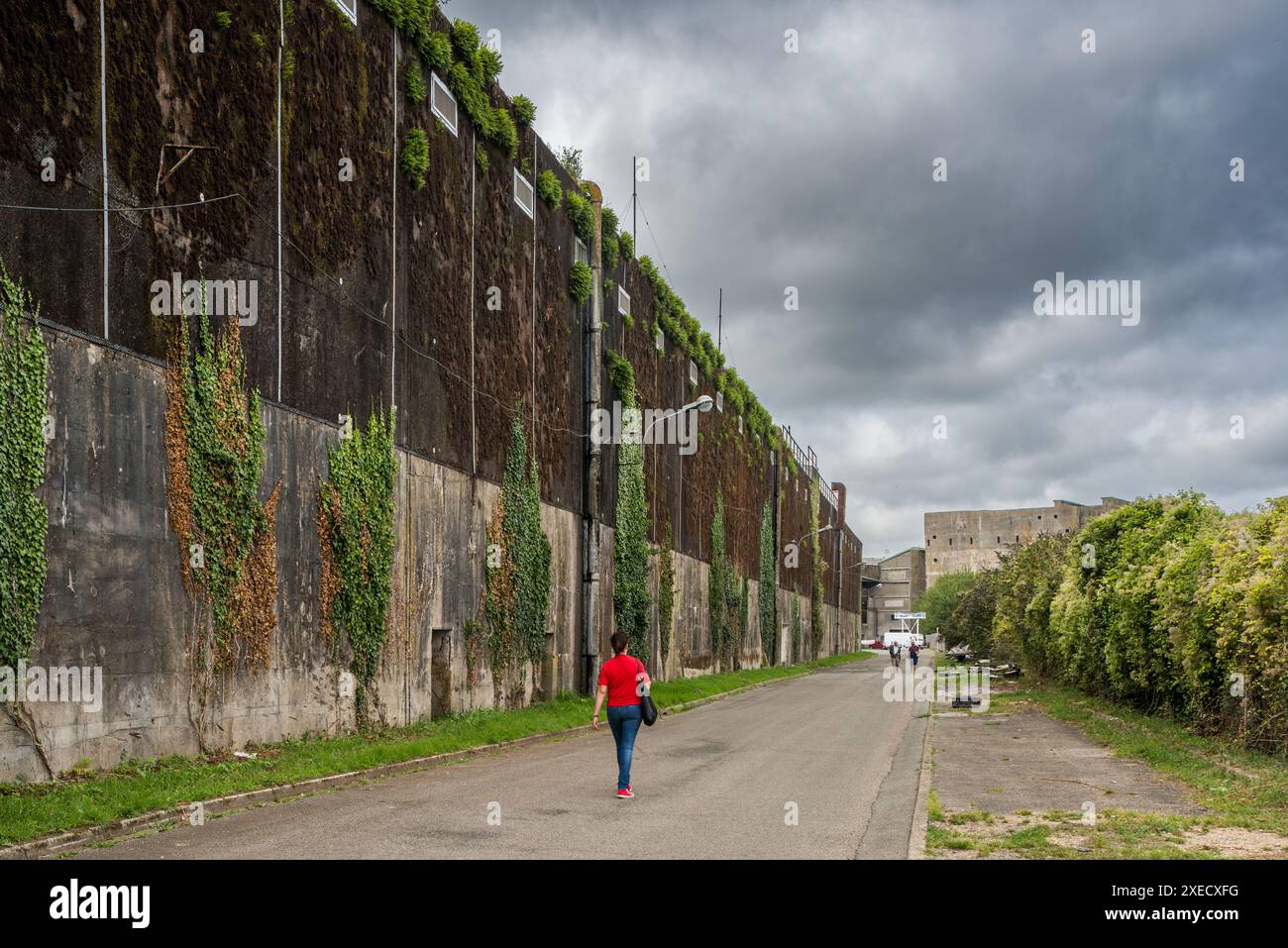 View of the German submarine base from World War II in Lorient, Brittany, France. The large structure showcases historical significance. Stock Photo