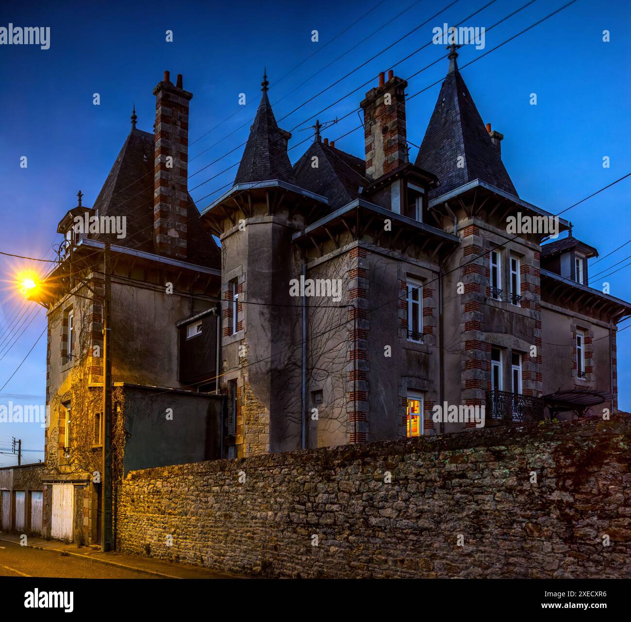 A beautifully lit historic mansion in Vannes, Brittany, France during 