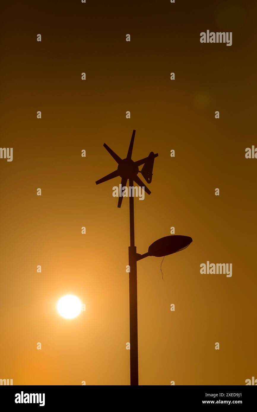 A street lamp using wind turbine to generate electricity adn store ...