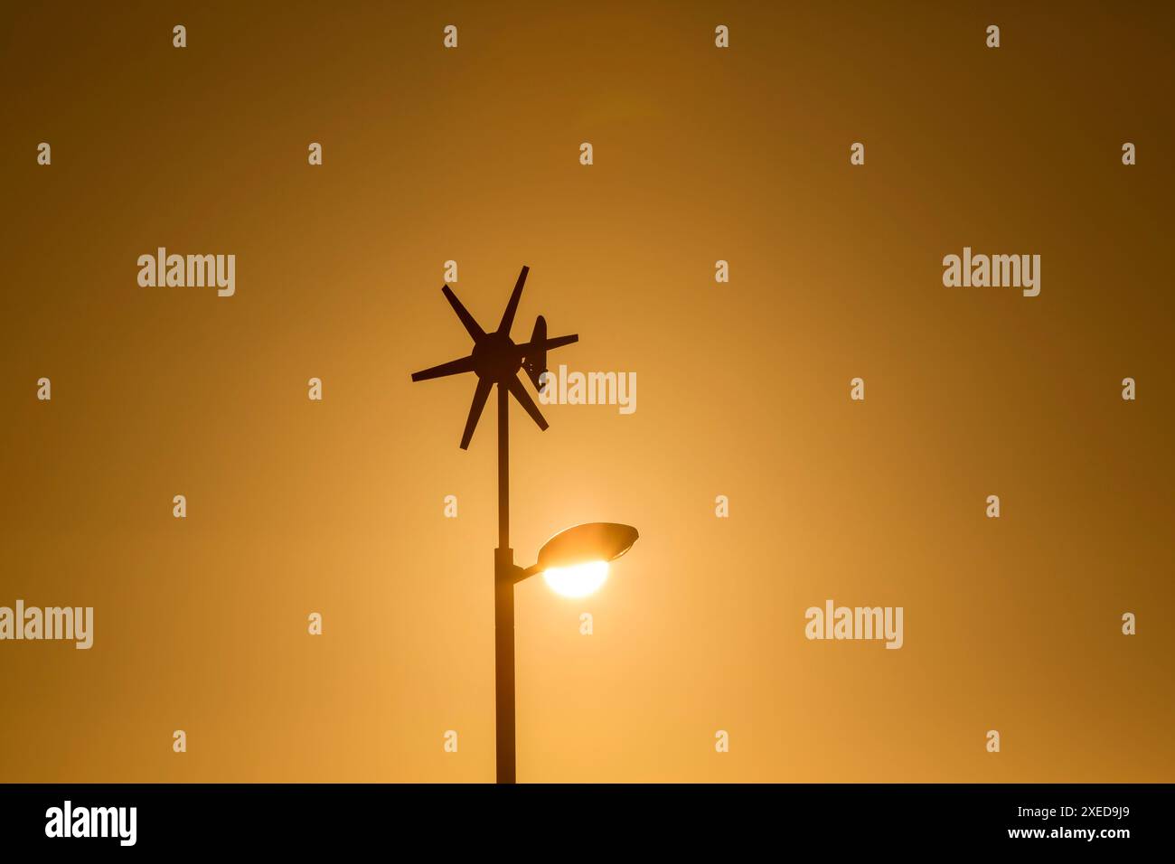 A street lamp using wind turbine to generate electricity adn store ...
