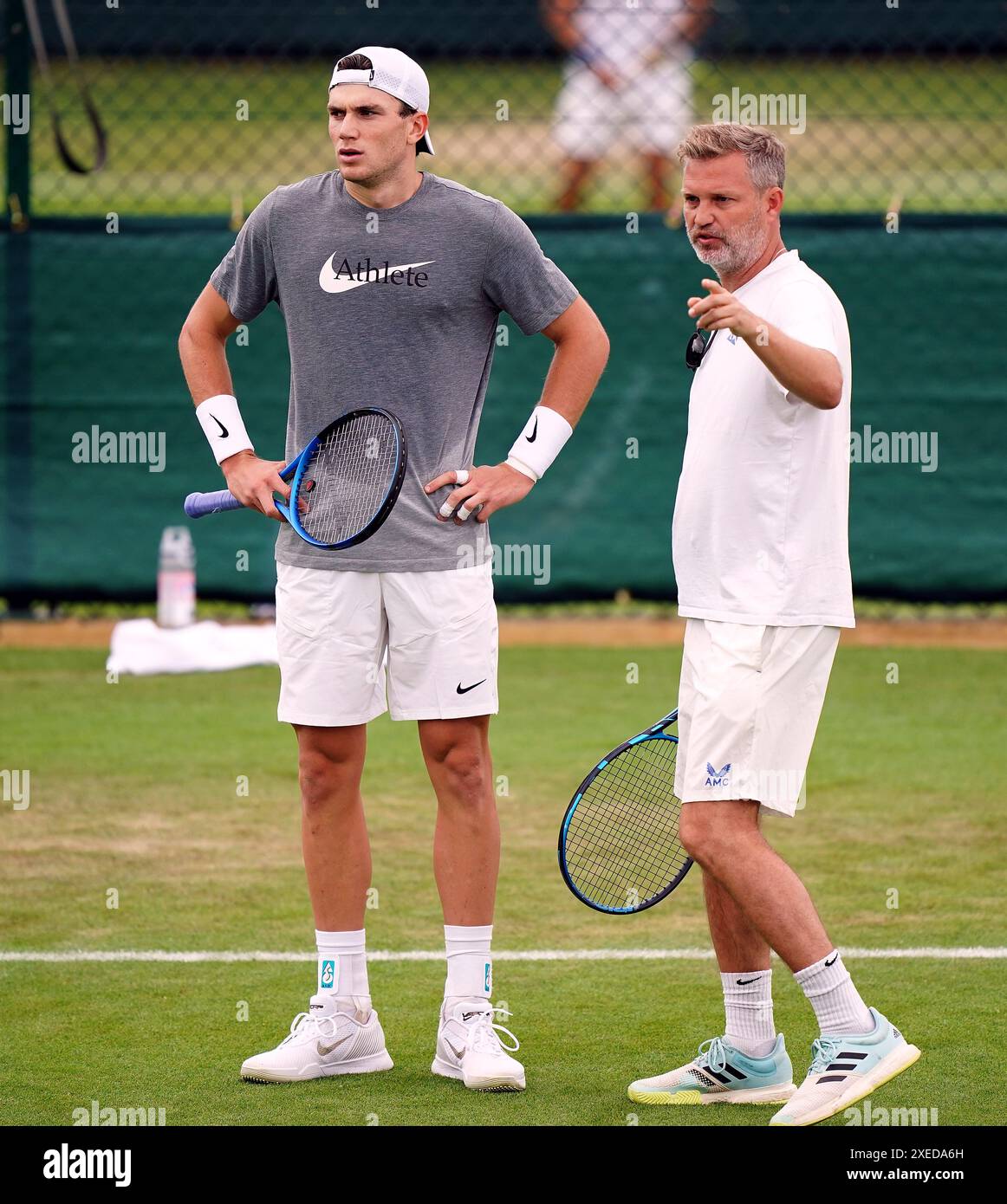 Jack Draper and coach James Trotman practising at the All England Lawn