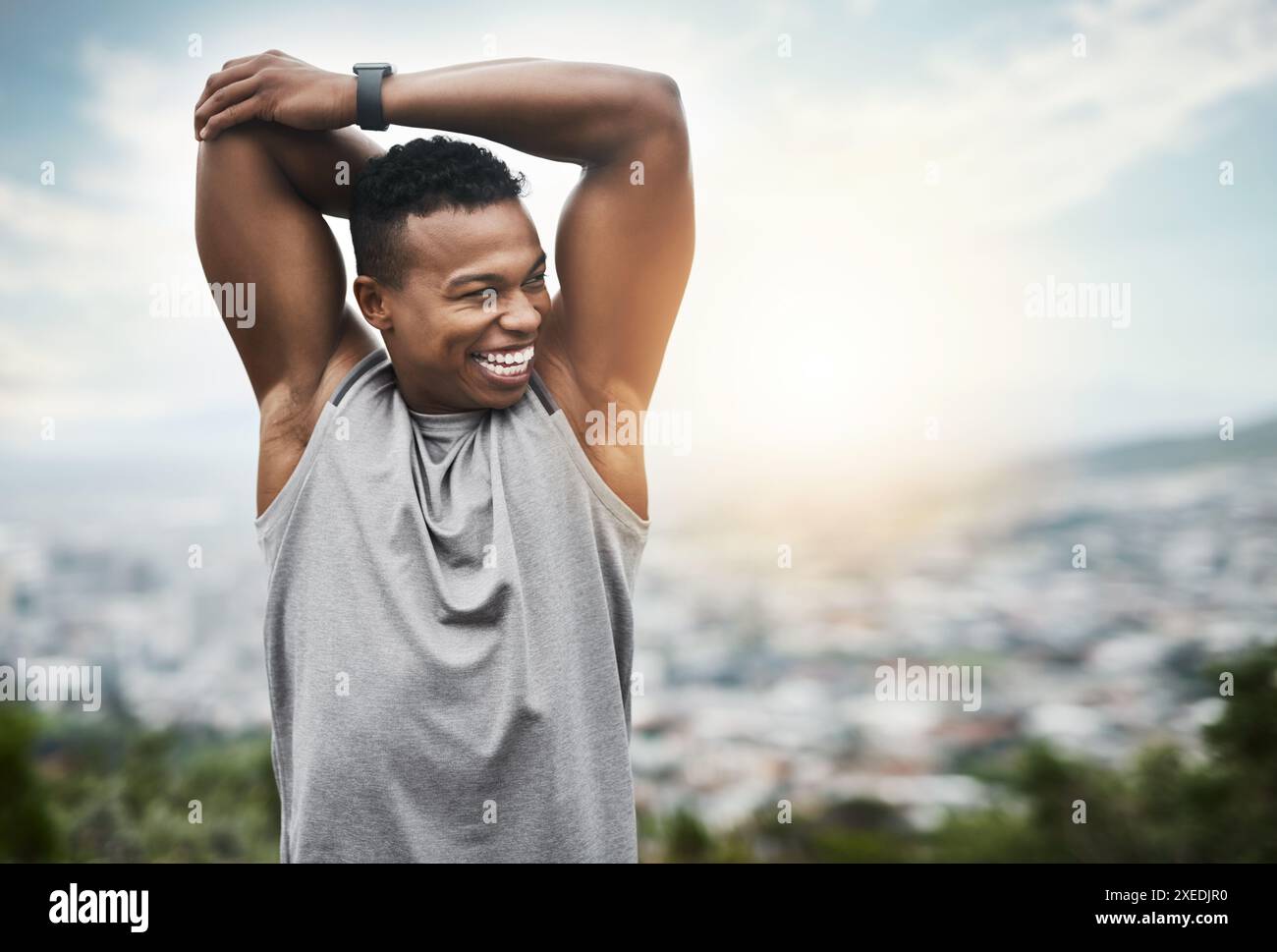 Young man stretching arm sunrise hi-res stock photography and images ...