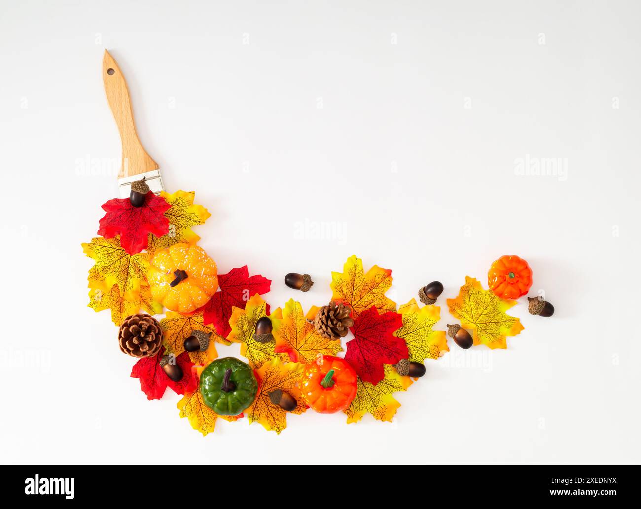 Creative autumn or fall layout made with paint brush fallen leaves ...