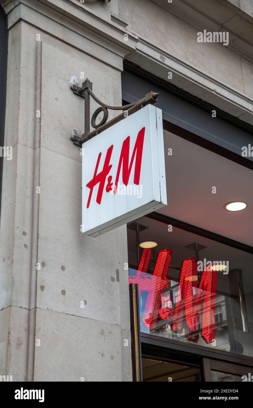 An HM shop Hennes and Mauritz Hennes Mauritz AB is a Swedish multinational clothing retail company known for its fast fashion clothing for men women teenagers and children. Here in Nice France.Photo J...