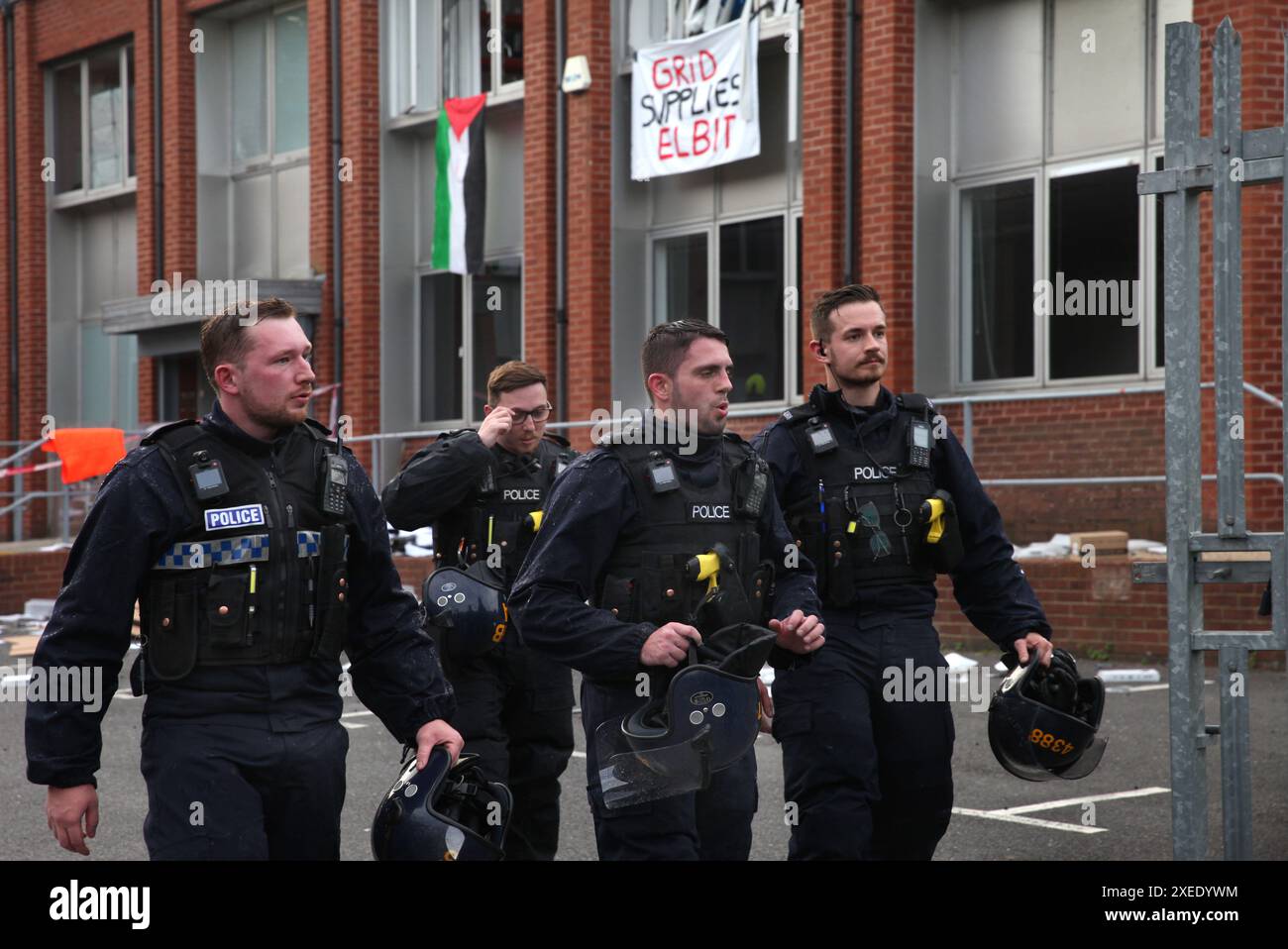 High Wycombe, England, UK. 27th June, 2024. Riot squad police officers leave Grid's offices after removing activists that had gained access to the building overnight and caused damage. Palestine Action activists as well as targeting Elbit Systems they been targeting partner companies of the Israeli arms company and those that invest in the company, by using repeated direct action to disrupt and isolate Elbit. A number of companies in the last year have broken off all ties with the weapons manufacturer. Grid Defence Systems provides components for Elbit Systems. (Credit Image: © Mar Stock Photo