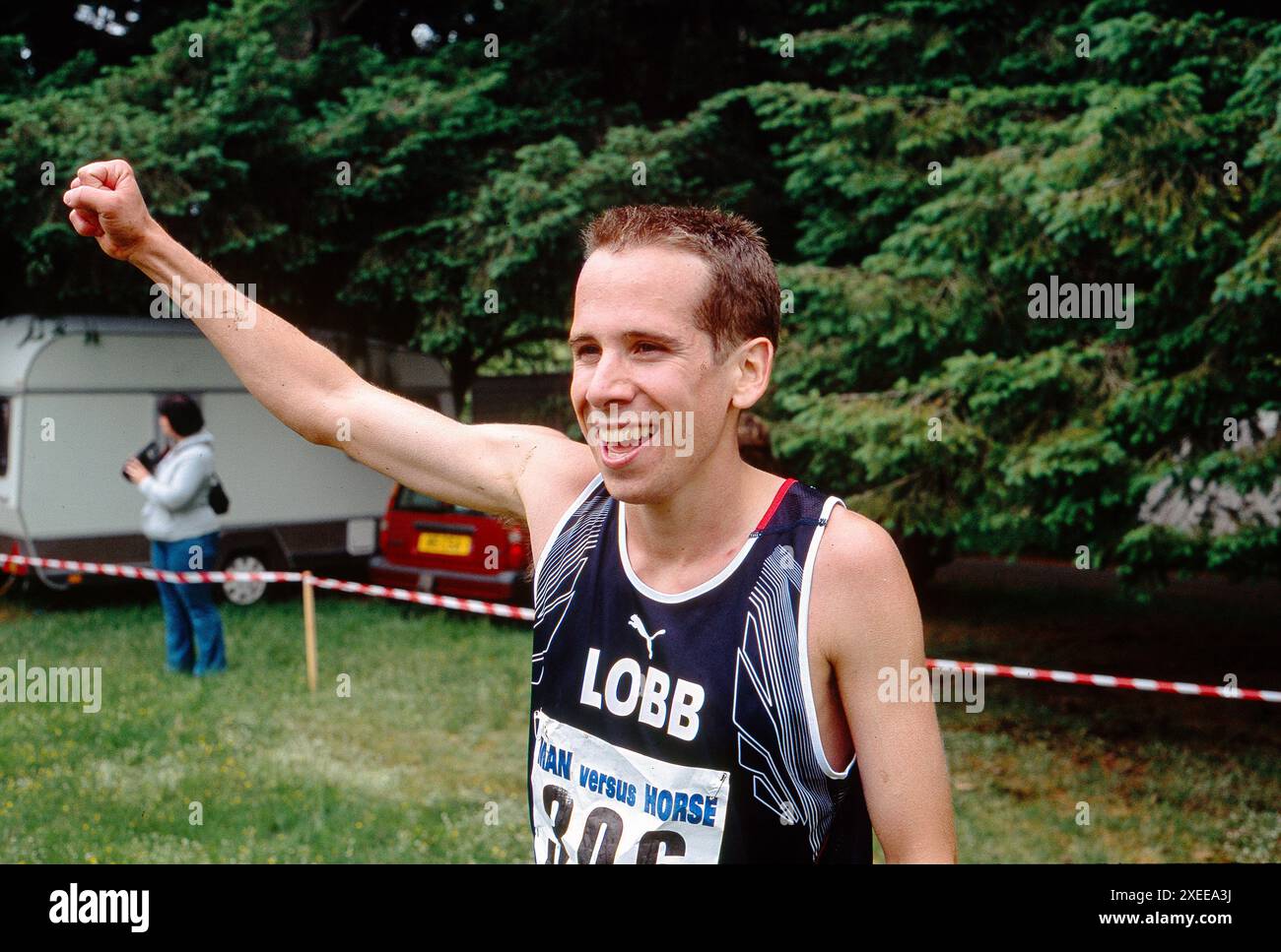 Huw Lobb, who in 2004 became the first runner to win the annual Man versus Horse Marathon, held annually over 22 miles of very rough country near Llanwrtyd Wells in mid-Wales, UK. He won with a time of 2 hours 5 minutes and 19 seconds, just 2m and 17secs ahead of the first horse to finish Stock Photo