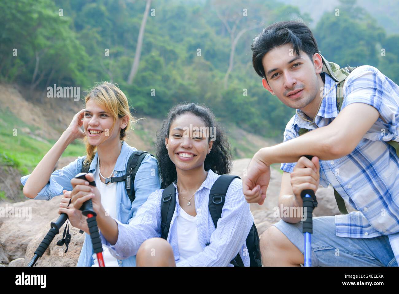 Young man hiking in tropical hi-res stock photography and images - Alamy
