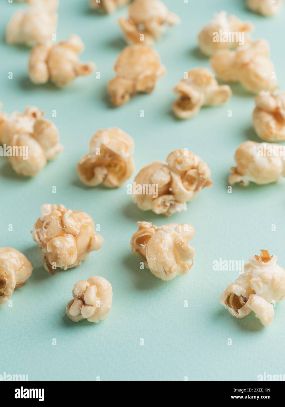 Popcorn on blue background with copy space Stock Photo