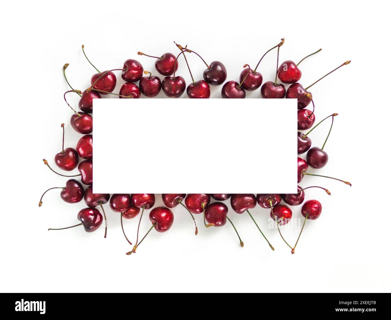 Cherry isolated on white with white rectangle Stock Photo