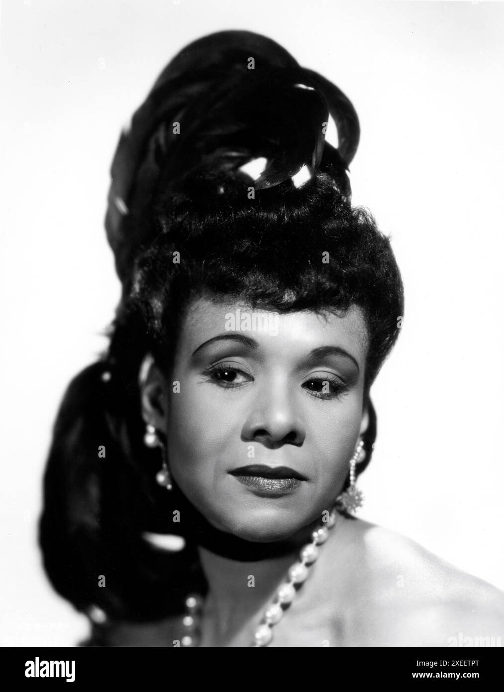 KATHERINE DUNHAM Head and Shoulders Portrait as Odette in CASBAH 1948 director JOHN BERRY novel Henri La Barthe musical story Erik Charell costumes Yvonne Wood choreography Katherine Dunham / Dunham Group Marston productions / Universal Pictures Stock Photo