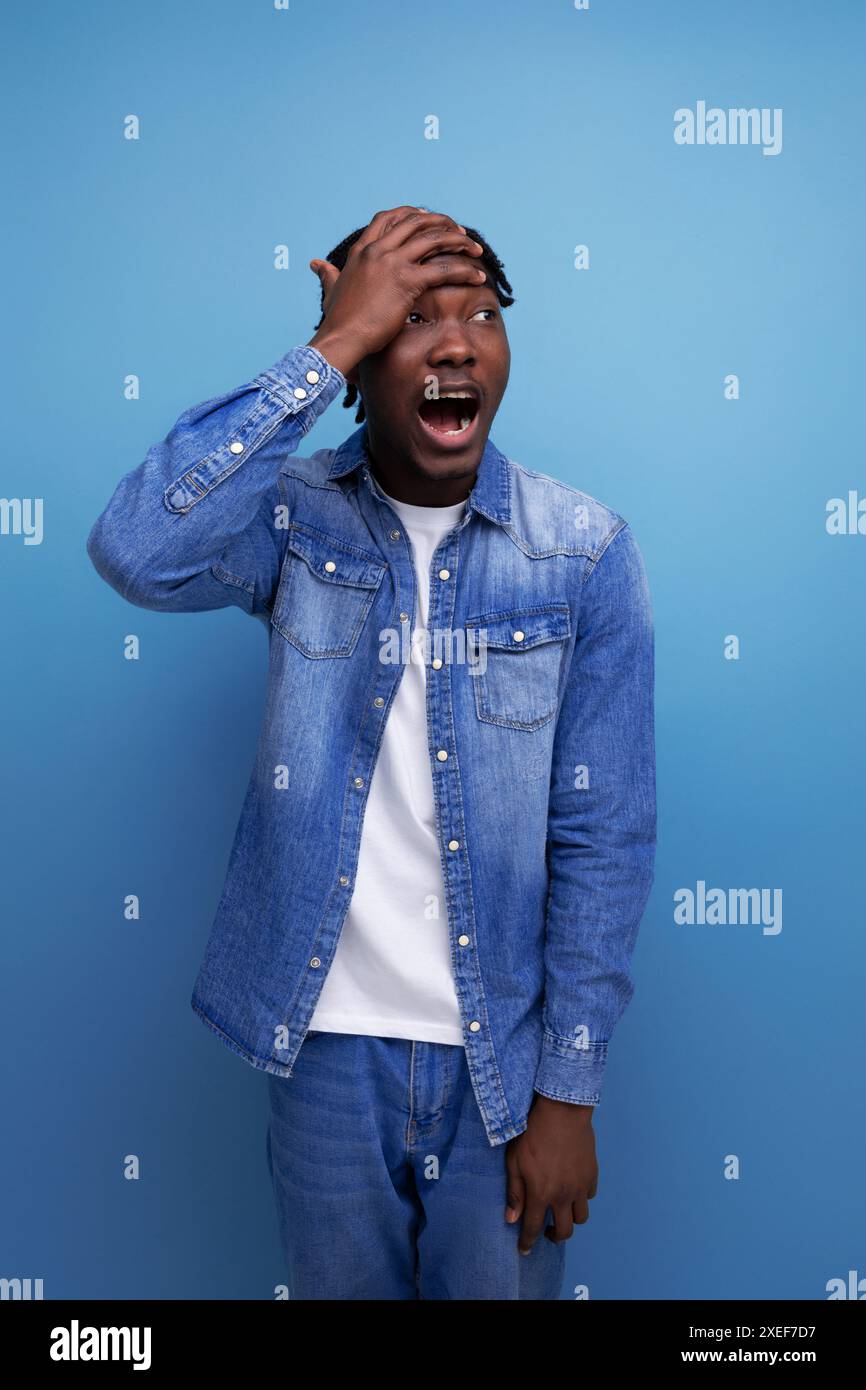 Charismatic stylish african man with black dreadlocks screwed Stock Photo