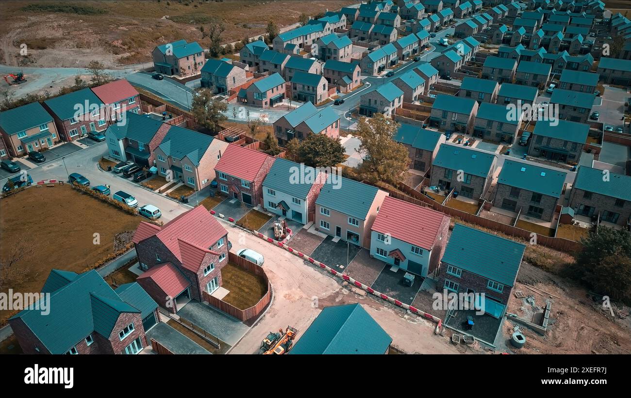 Aerial view of a suburban neighborhood with rows of houses featuring ...