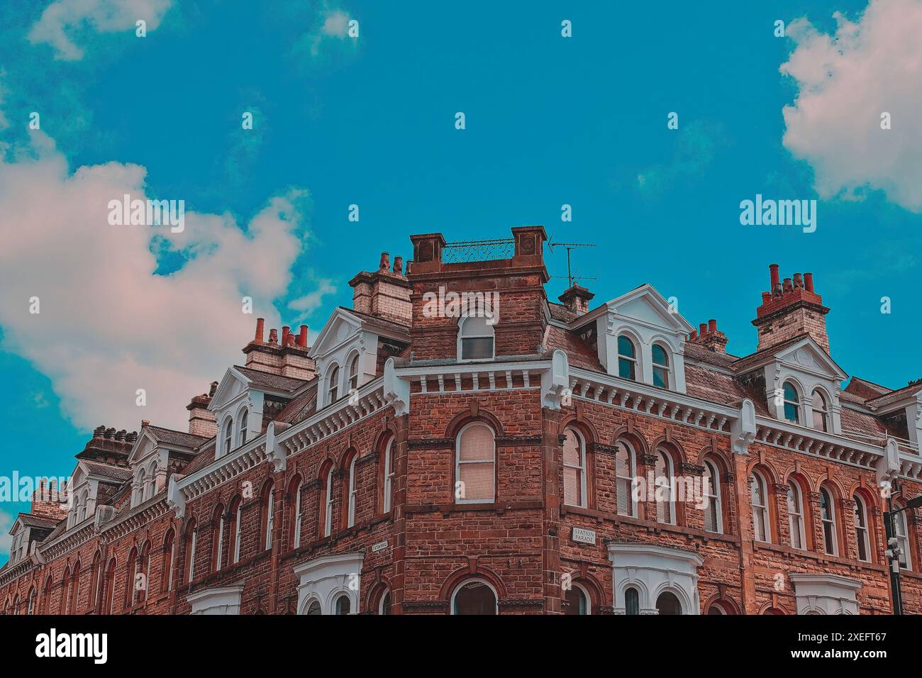 A historic brick building with ornate architectural details under a ...