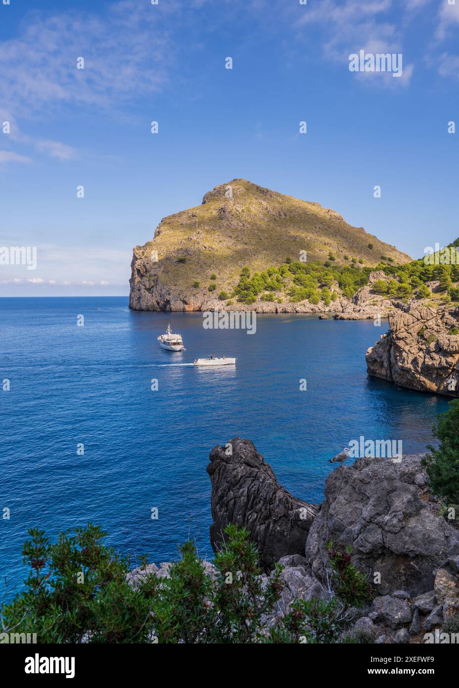 Amazing view of Mallorca, beautiful sea bay with a luxury tourist ship on the coast of Sa Calobra, Mallorca Mediterranean Sea, Balearic Islands. Stock Photo