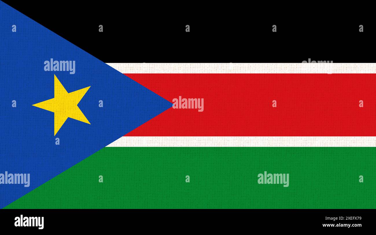 Flag of South Sudan. South Sudanian flag on fabric surface. African country Stock Photo