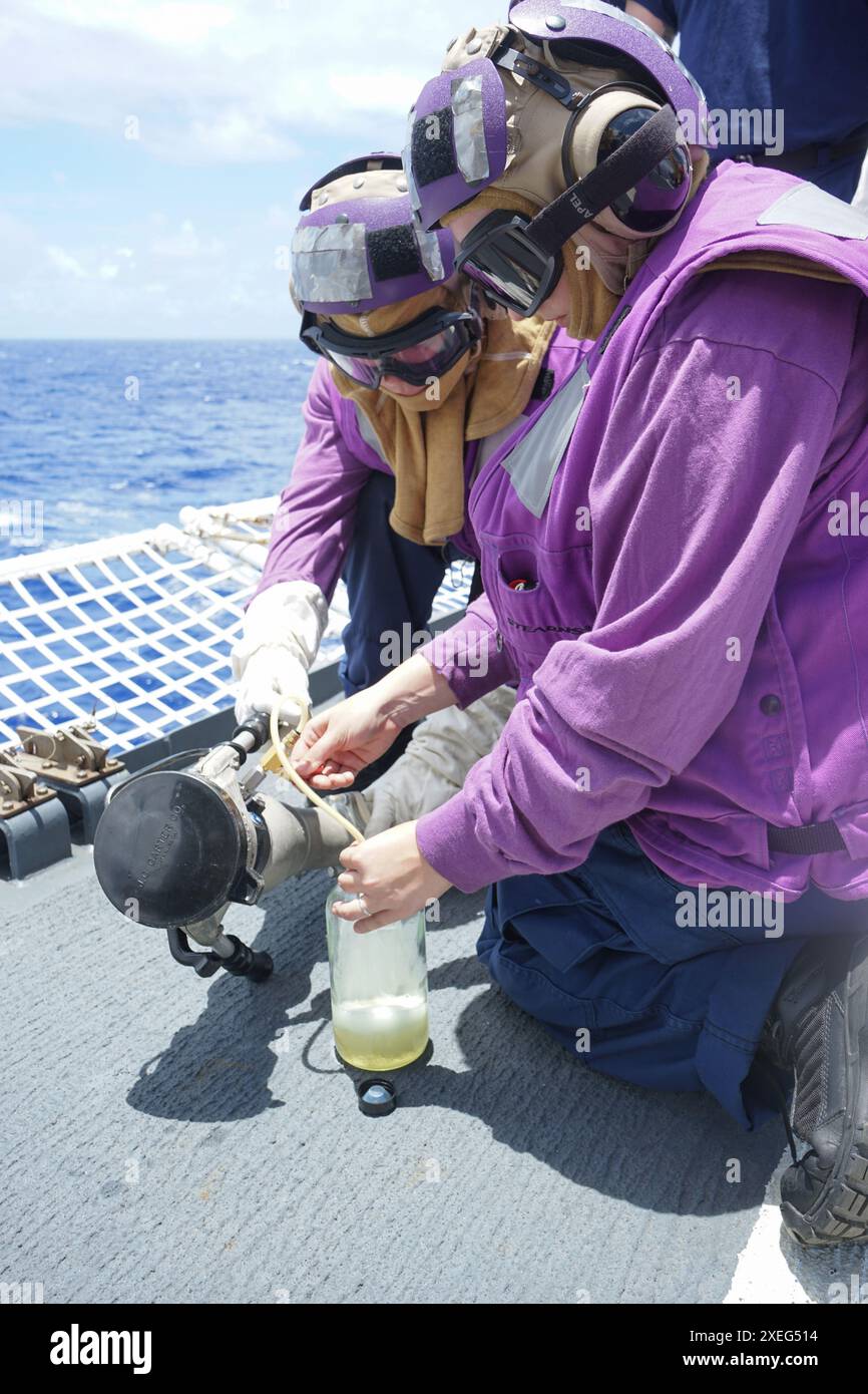 Crew members assigned to Coast Guard Cutter Stone (WMSL 758) conduct a ...