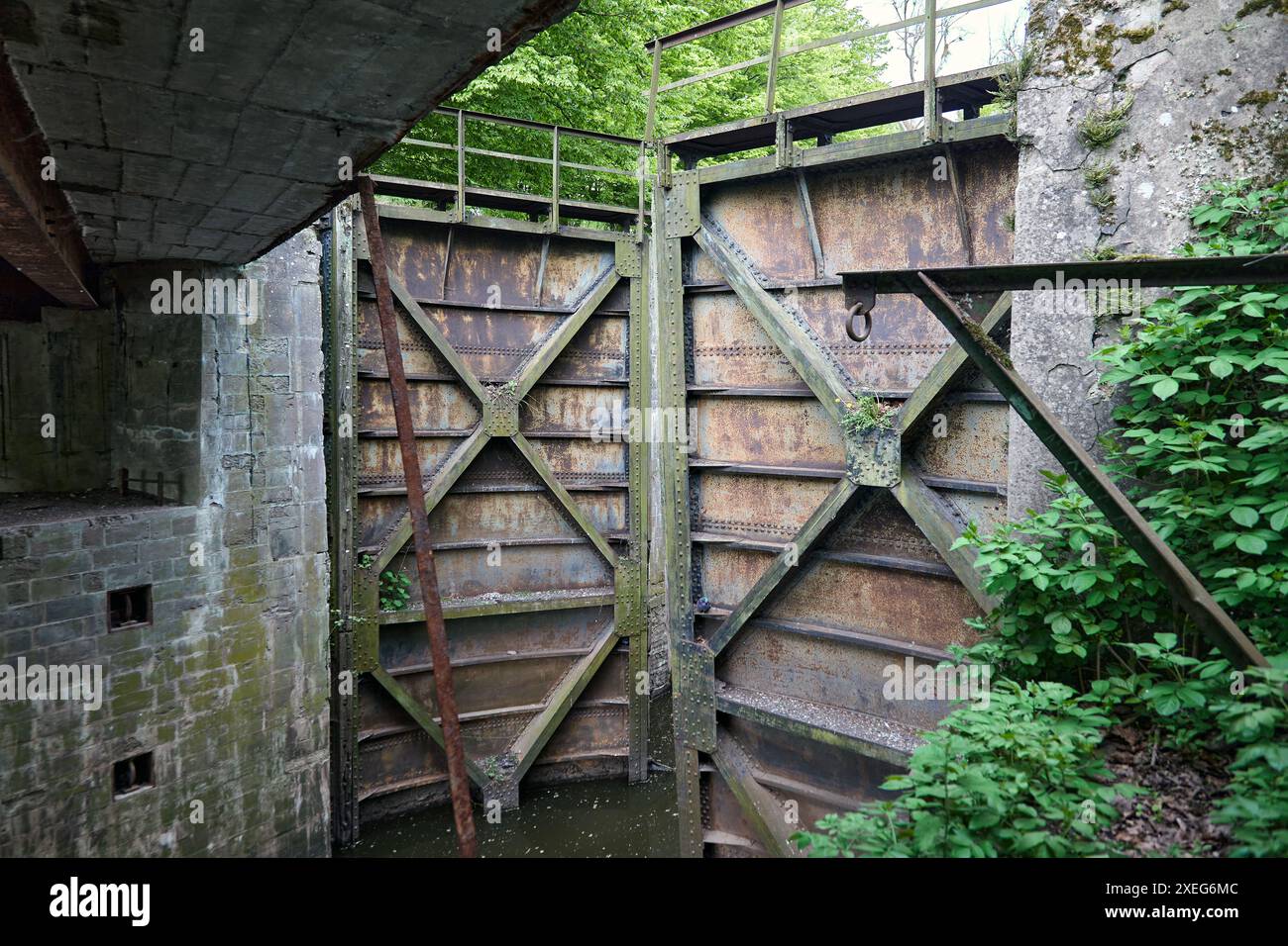 Abandoned old Masurian lock in rusty, non-functional condition Stock Photo