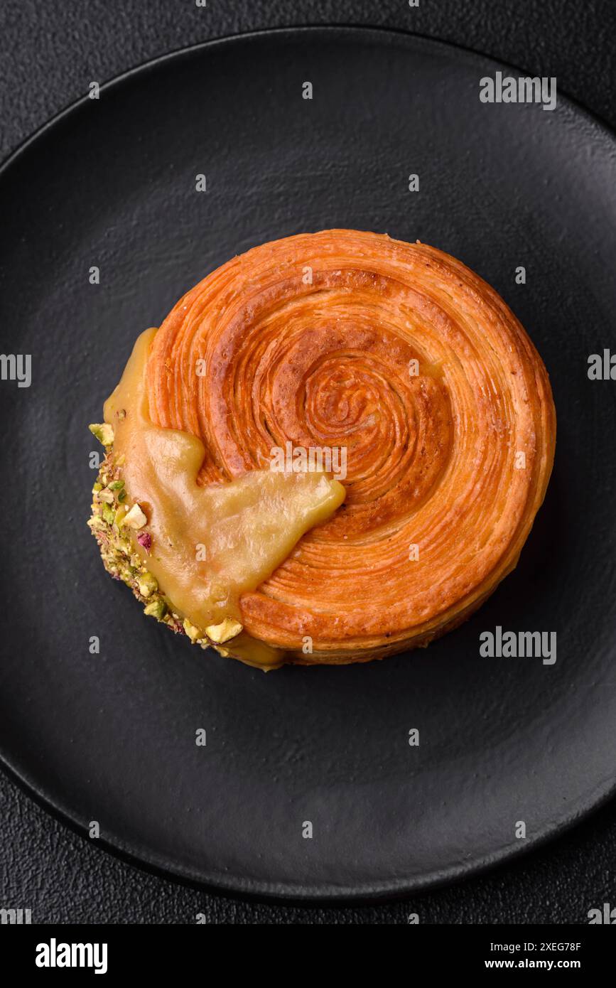 Round puff pastry croissant with raspberry filling or new york roll ...