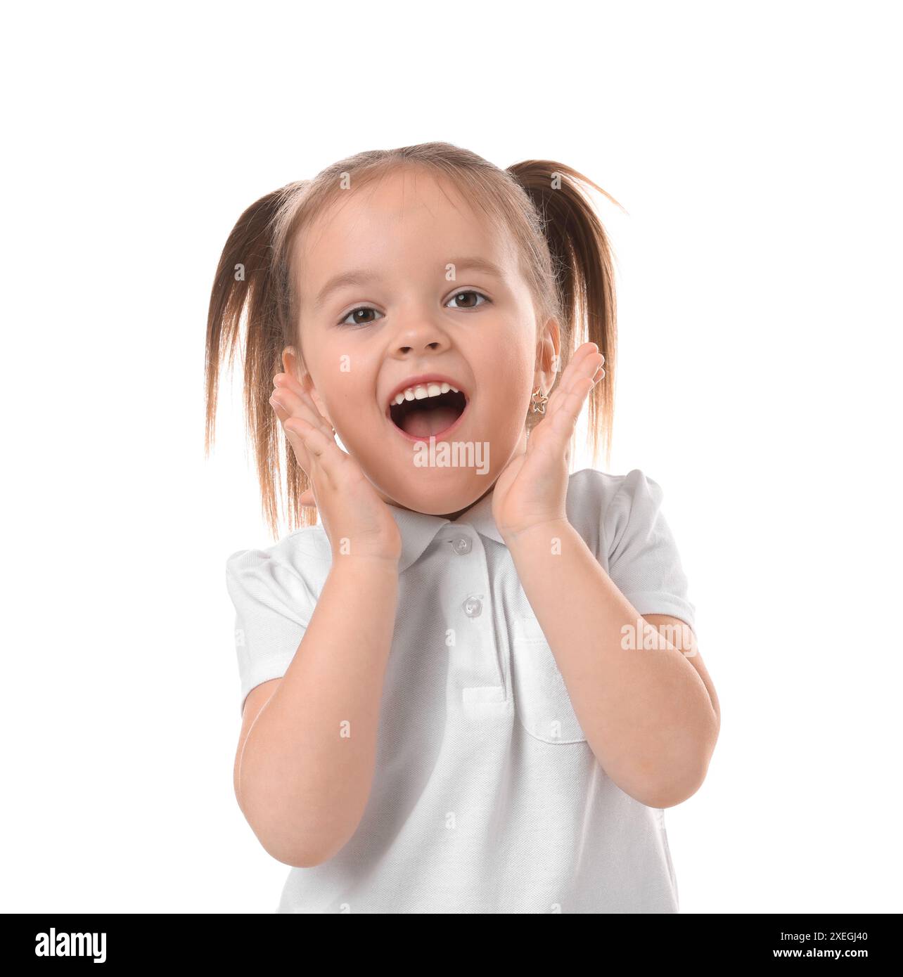 Portrait of emotional little girl on white background Stock Photo - Alamy