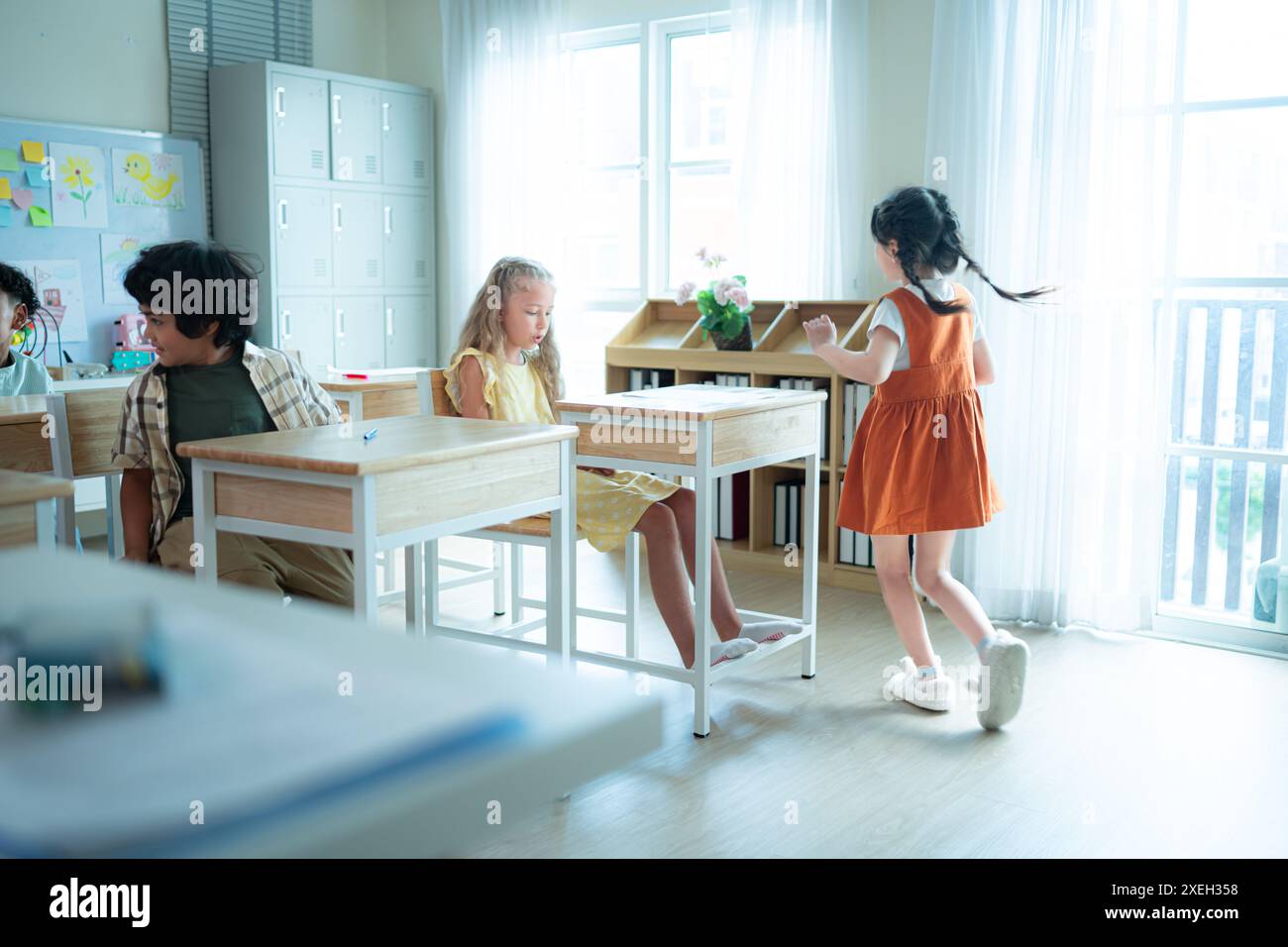 Children with classroom presentation activities in front of the classroom Stock Photo