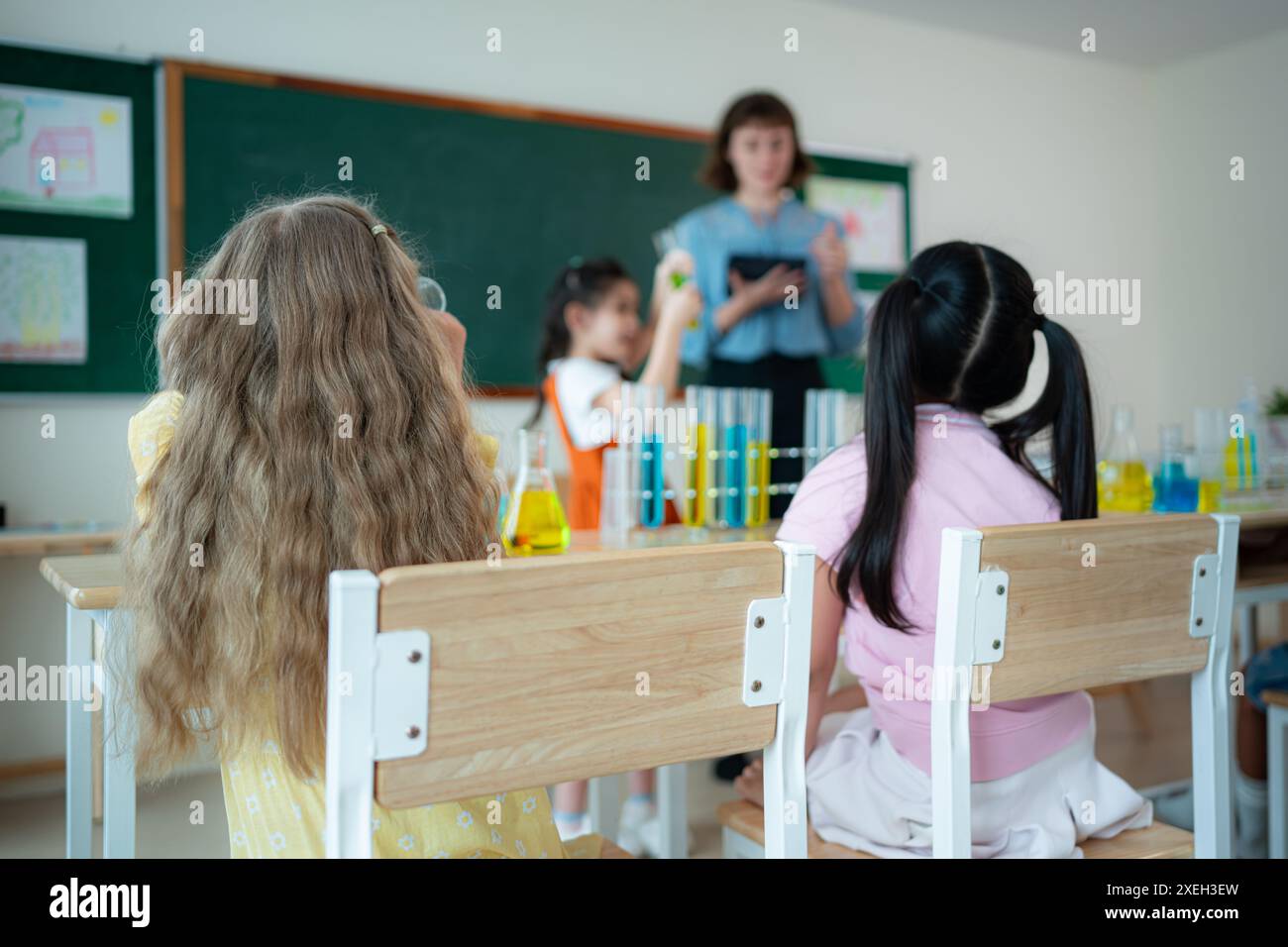 Teacher and students, Learn and experiment with science in a school ...