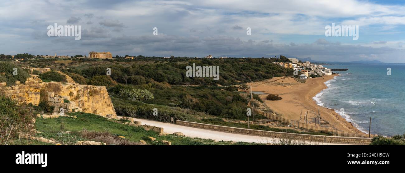 Panorama landscape with the temples of Selinunte and the beach and village of Marinello di Selinunte in Sicily Stock Photo