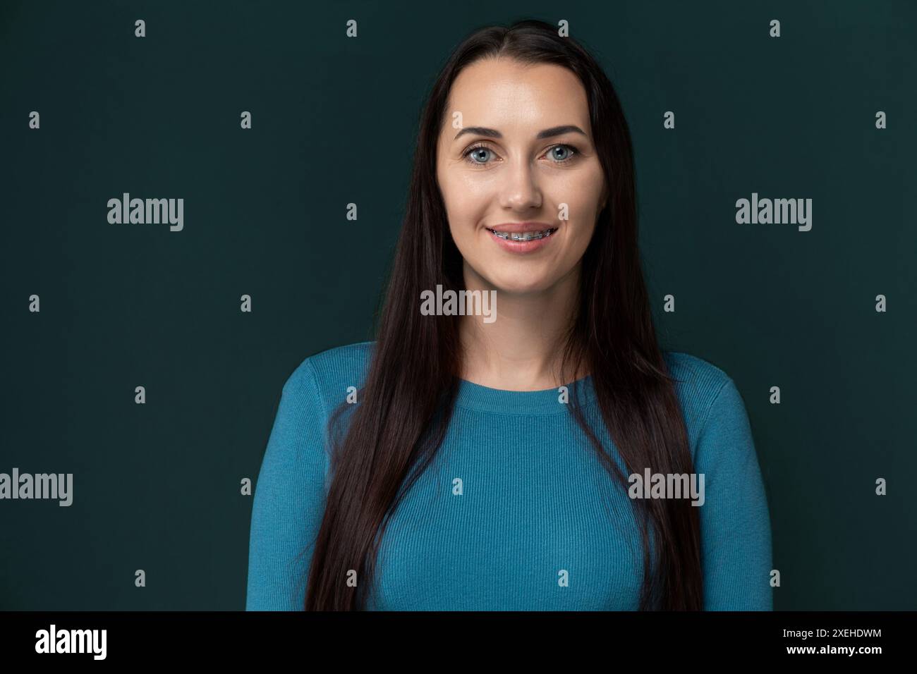 Woman in blue shirt hi-res stock photography and images - Alamy