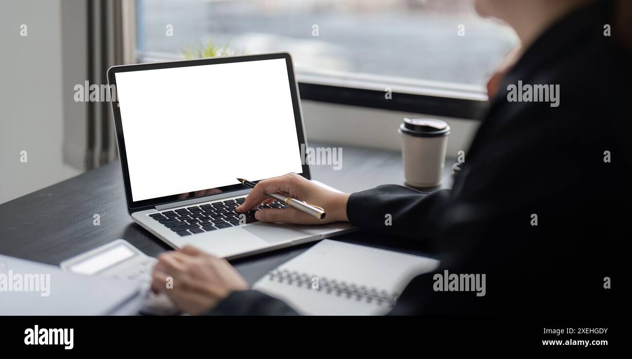 Professional Business Workspace with Laptop Mockup Screen for Modern Office and Remote Work Environments Stock Photo