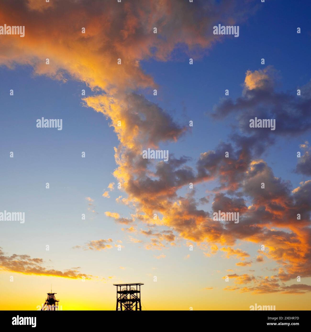 Atmospheric sunrise, Gneisenau district park with the two conveyor towers, Dortmund, Germany Stock Photo