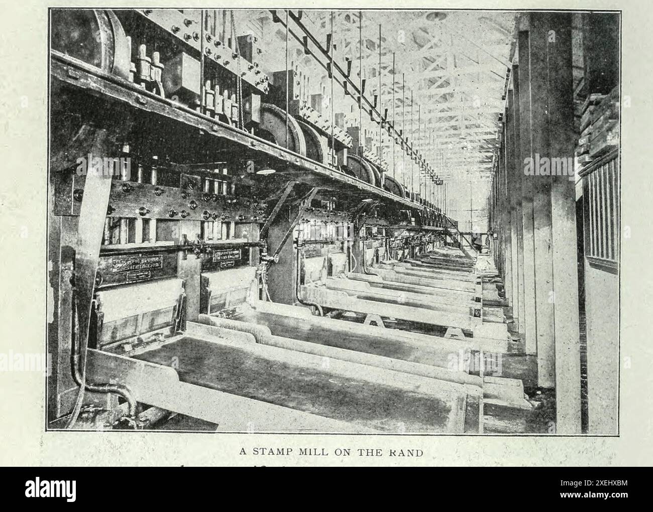 A STAMP MILL ON THE RAND from the Article SOUTH AFRICAN QUESTIONS FROM AN ENGINEERING STANDPOINT. By Albert Williams, Jr. from The Engineering Magazine Devoted to Industrial Progress Volume XVIII 1899-1900 The Engineering Magazine Co Stock Photo