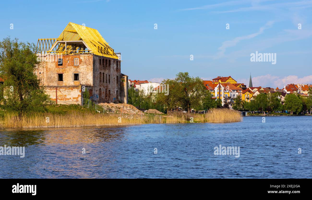 Elk, Poland - May 3, 2024: Panoramic view of Elk town with Teutonic Order Castle ruins at Jezioro Elckie Lake in Mazuria lakeland region Stock Photo