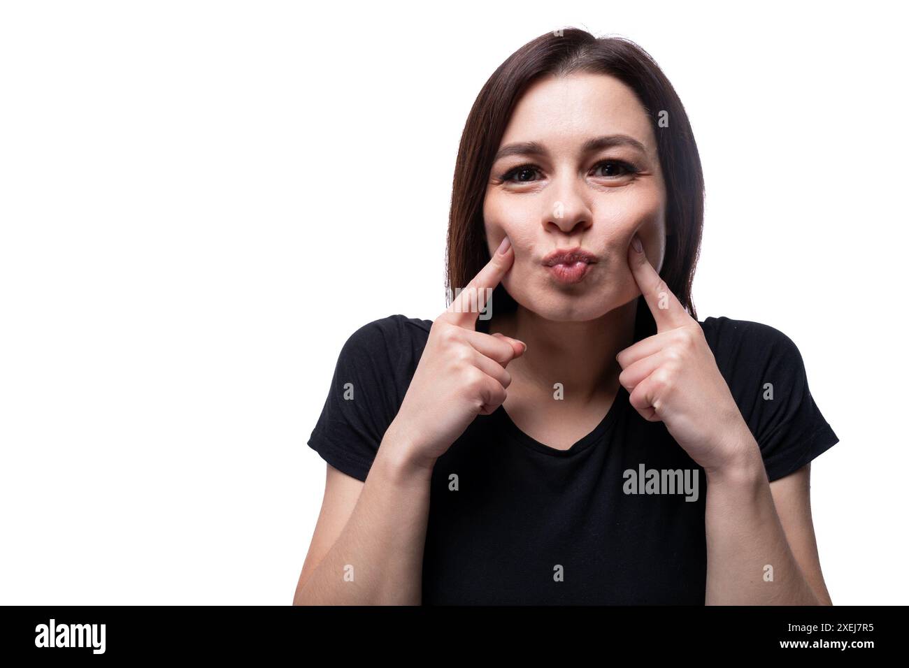 25 year old brunette smiling woman of European appearance Stock Photo