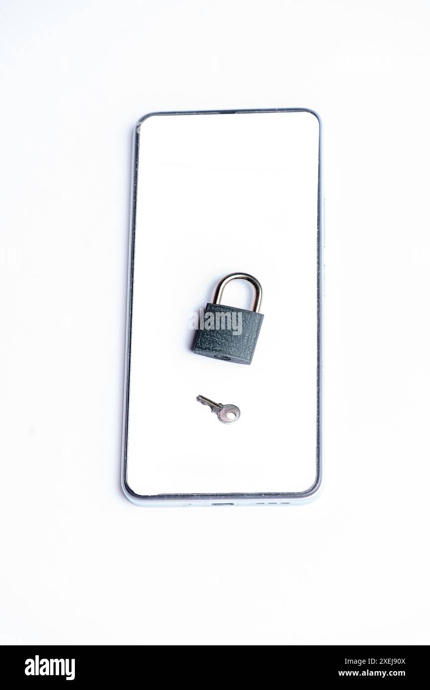 Mobile screen lock and key isolated on white background Stock Photo