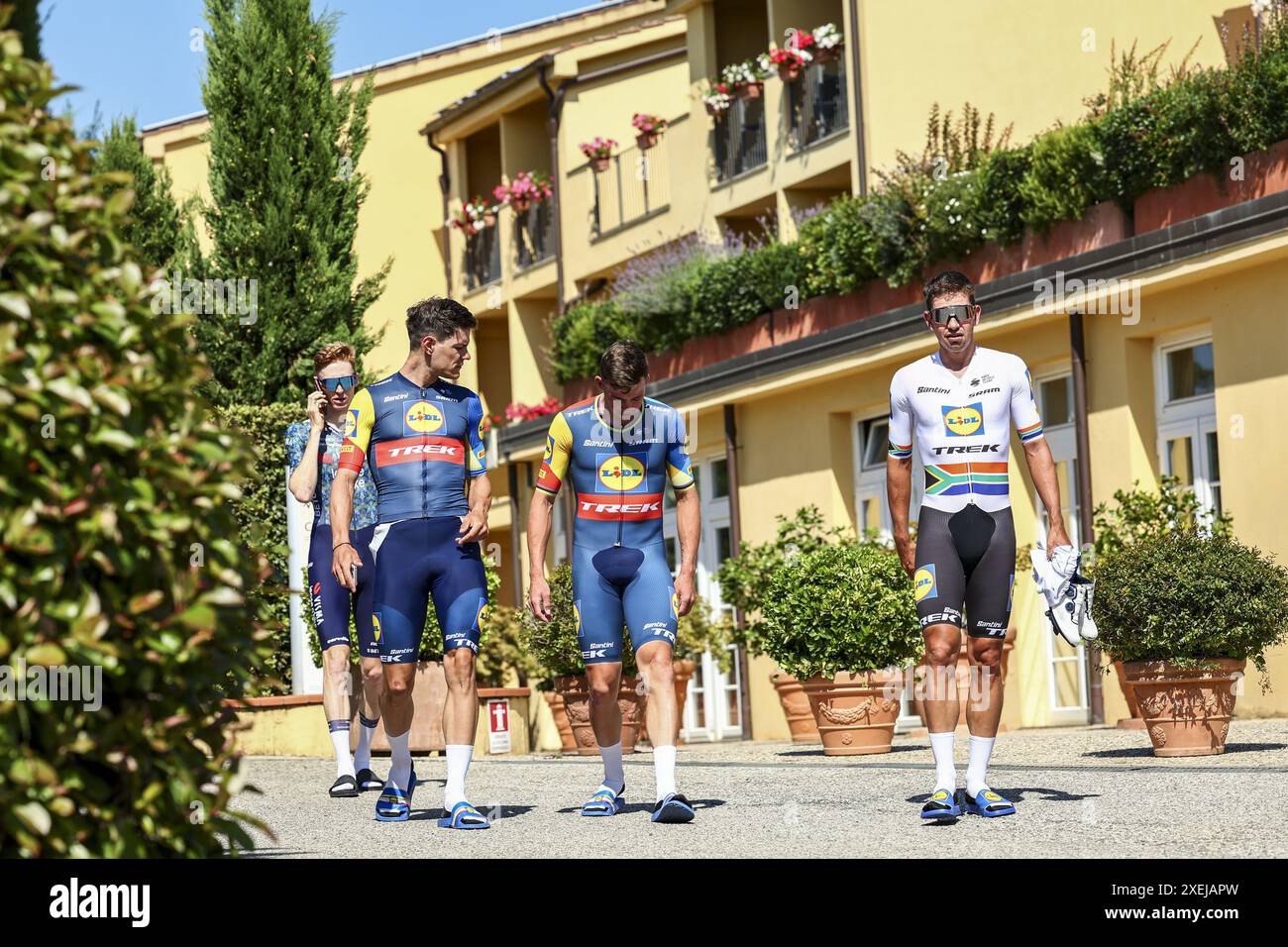 Florence, France. 28th June, 2024. Belgian Jasper Stuyven of Lidl-Trek, Danish Mads Pedersen of Lidl-Trek and South-African Ryan Gibbons of Lidl-Trek pictured during preparations ahead of the 2024 Tour de France cycling race, Friday 28 June 2024, in Florence, Italy. The 111th edition of the Tour de France starts on Saturday 29 June in Florence, Italy, and will finish in Nice, France on 21 July. BELGA PHOTO DAVID PINTENS Credit: Belga News Agency/Alamy Live News Stock Photo