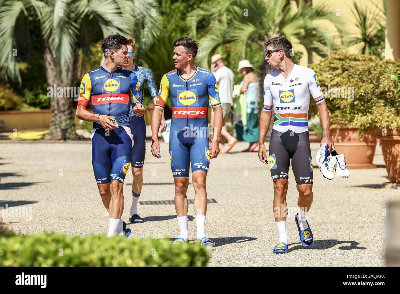 Florence, France. 28th June, 2024. Belgian Jasper Stuyven of Lidl-Trek, Danish Mads Pedersen of Lidl-Trek and South-African Ryan Gibbons of Lidl-Trek pictured during preparations ahead of the 2024 Tour de France cycling race, Friday 28 June 2024, in Florence, Italy. The 111th edition of the Tour de France starts on Saturday 29 June in Florence, Italy, and will finish in Nice, France on 21 July. BELGA PHOTO DAVID PINTENS Credit: Belga News Agency/Alamy Live News Stock Photo