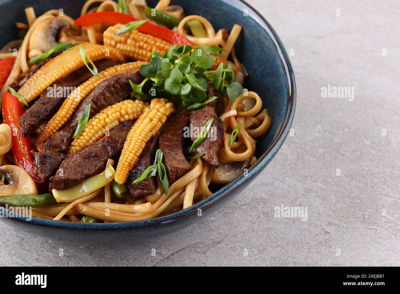 Udon with beef and teriyaki sauce Stock Photo