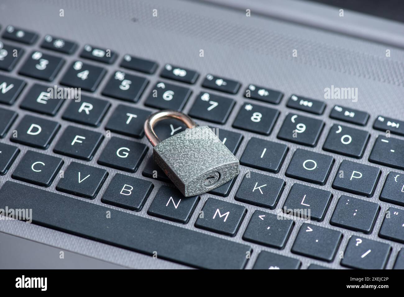 Close-up of closed lock on computer keyboard Stock Photo