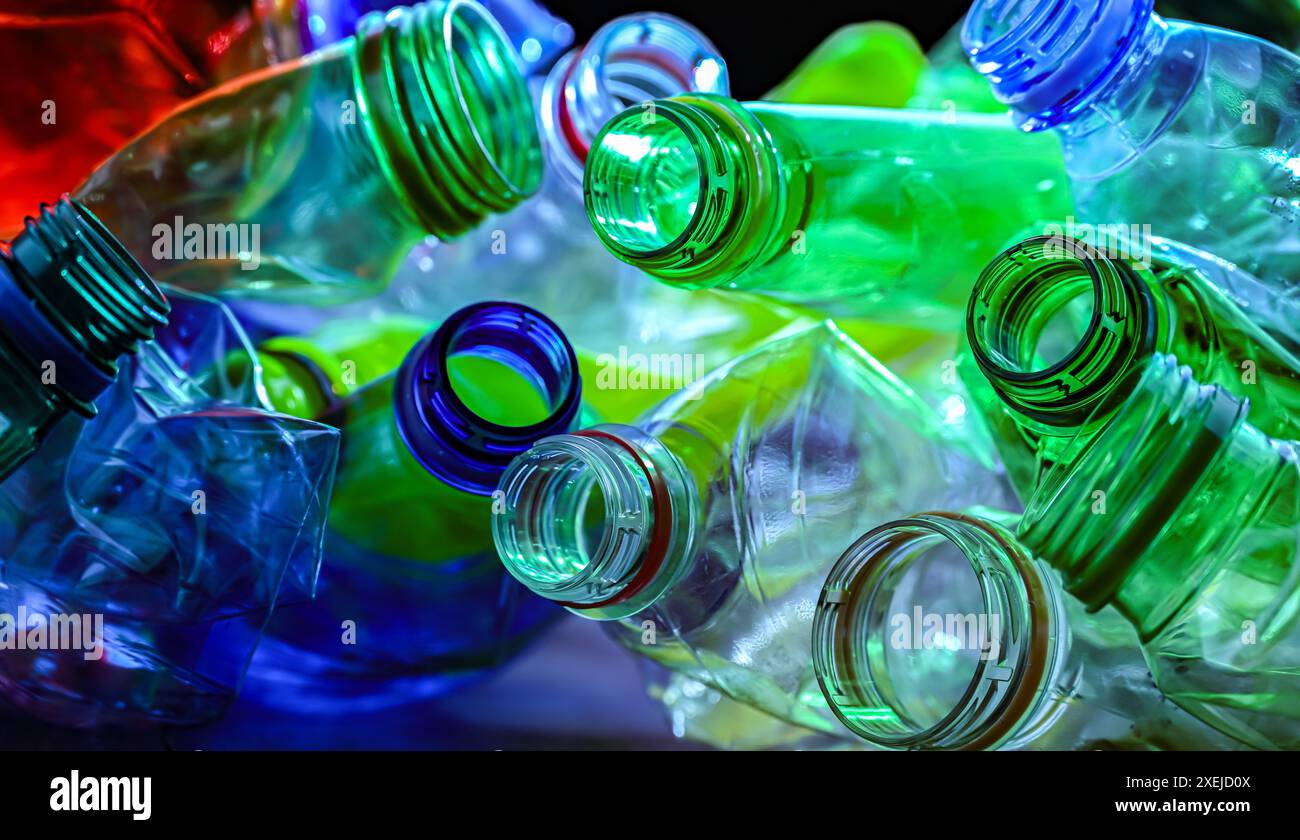 Empty colored drink bottles. Recyclable plastic waste. Stock Photo