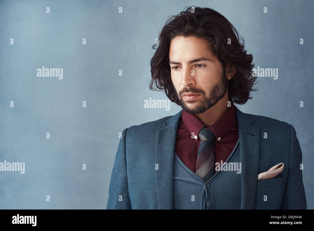 Thinking, businessman and serious for fashion in studio on gray background for career growth. Male person, confidence and idea as entrepreneur with Stock Photo