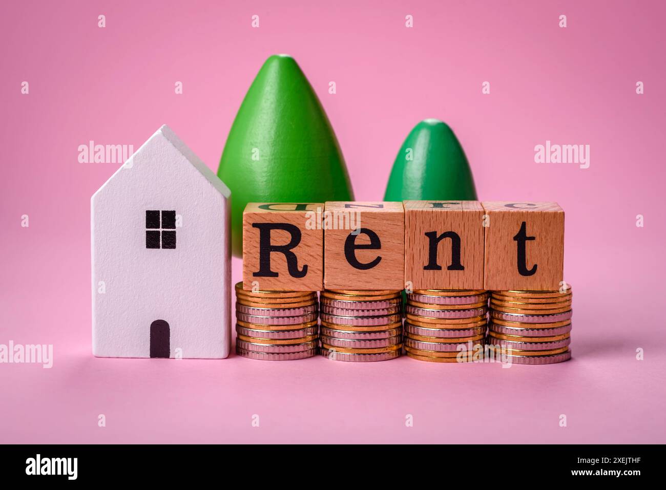 Small wooden house and the inscription for rent. Concept for sale, rental of real estate for a family Stock Photo
