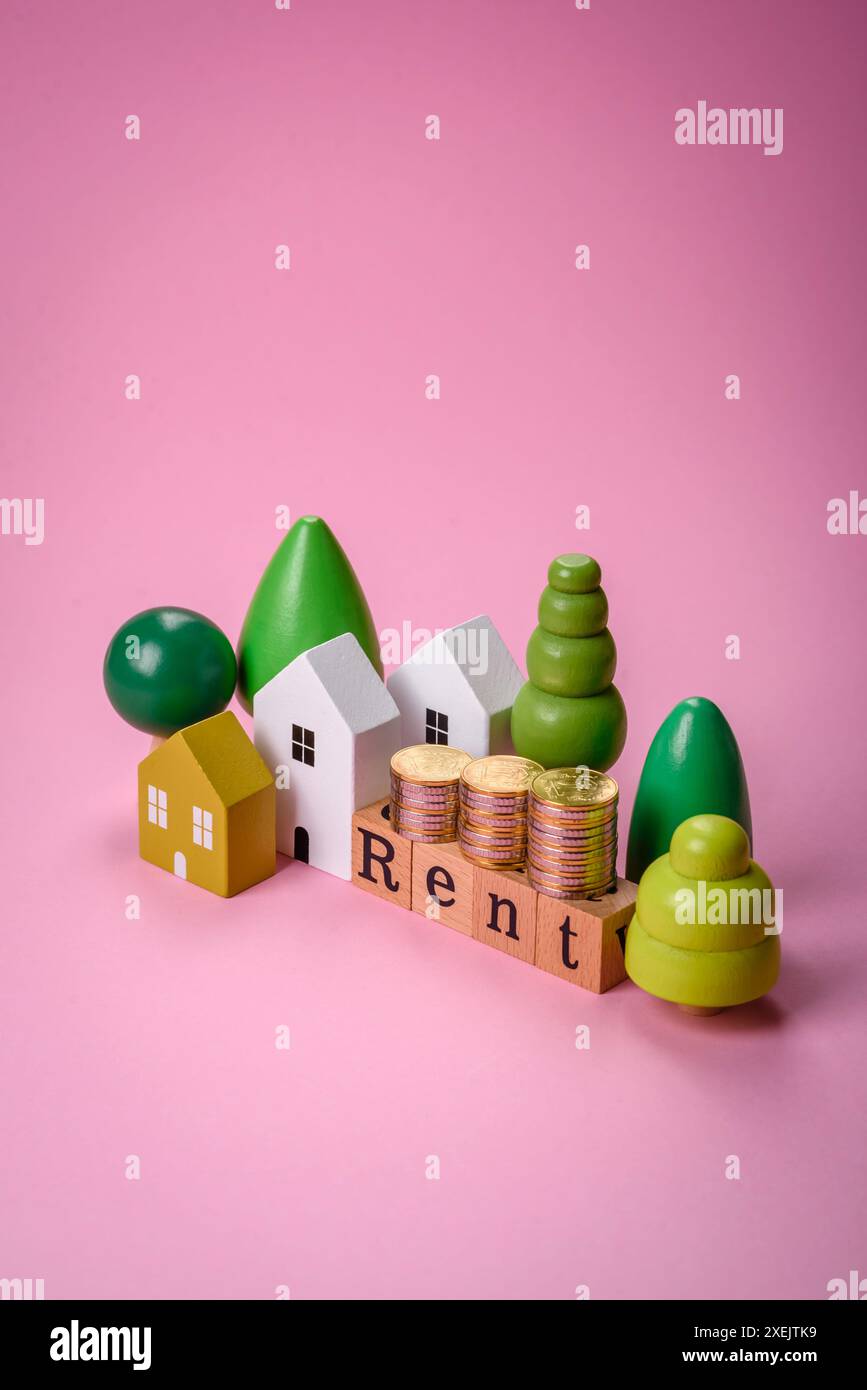 Small wooden house and the inscription for rent. Concept for sale, rental of real estate for a family Stock Photo