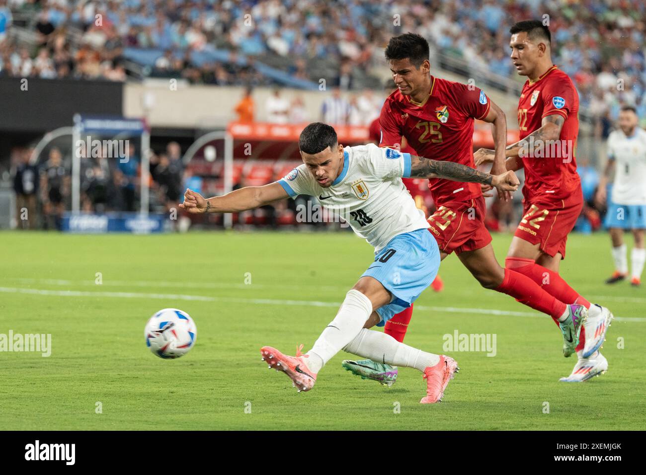 Maximiliano Araujo of Uruguay (20) shoots ball during group stage game